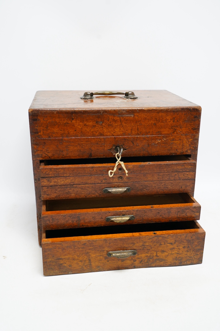 A Victorian circular mahogany solitaire board, 30cm diameter, together with a Victorian mahogany instrument box, 26cm high. Condition - fair